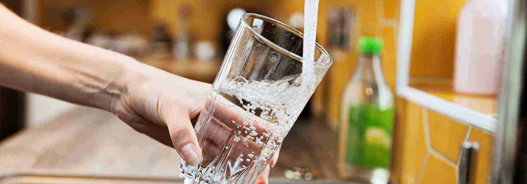 Tap water into a glass
