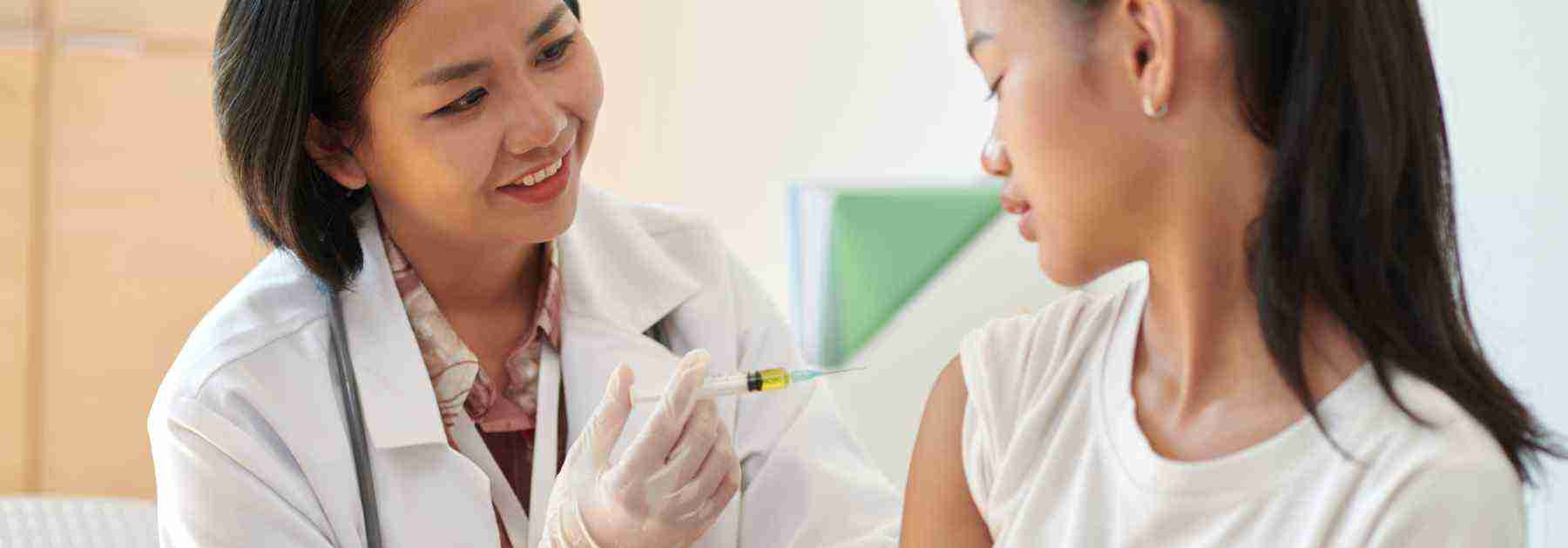 Teen getting a HPV vaccine