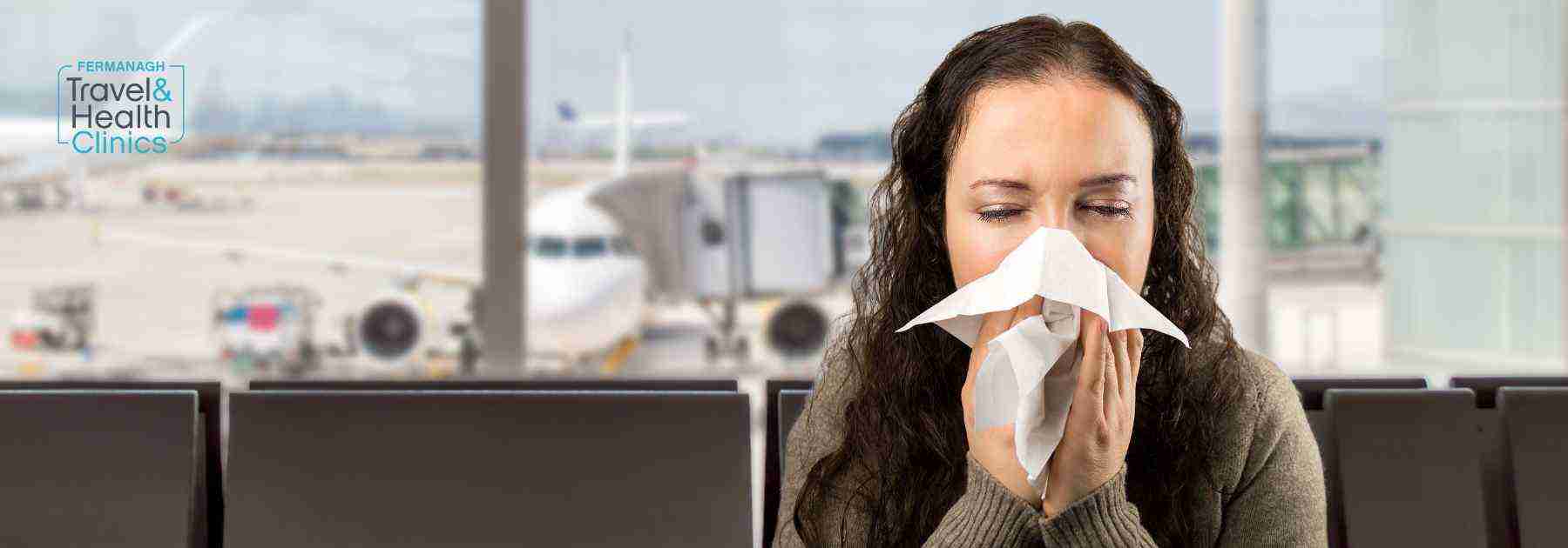 Travel sick woman in the airport